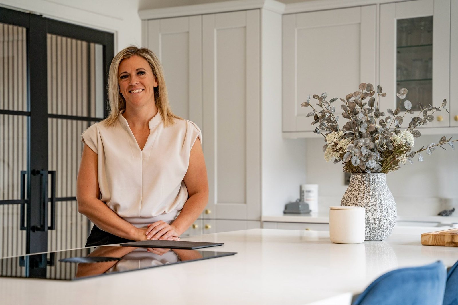 Emma Cavers at a kitchen island